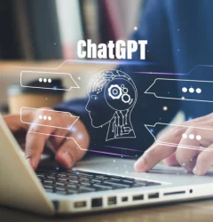 A person with laptop is working with chatGPT.